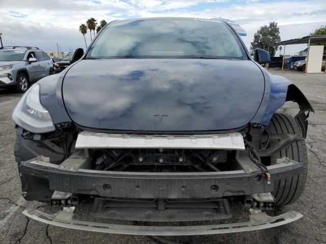 Photo 5 from auction – 2022 TESLA MODEL Y with VIN 7SAYGDEEXNF509194