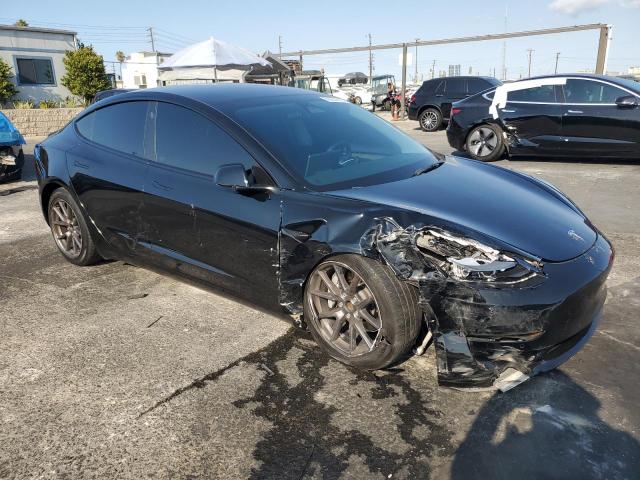Photo 4 from auction – 2022 TESLA MODEL 3 with VIN 5YJ3E1EA3NF357462