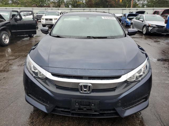 Photo 5 from auction – 2018 HONDA CIVIC LX with VIN 19XFC2F56JE044268