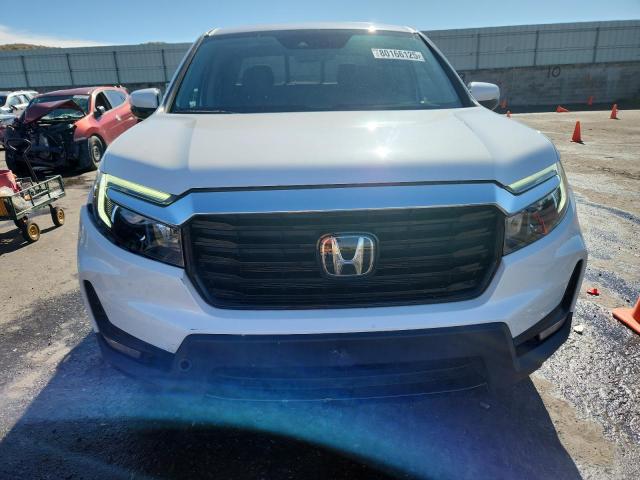 Photo 5 from auction – 2023 HONDA RIDGELINE with VIN 5FPYK3F75PB002011