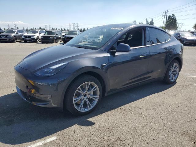 TESLA MODEL Y 2024 with VIN 7SAYGDED0RF097073 - Photo from auction