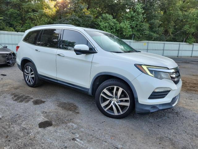 Photo 4 from auction – 2016 HONDA PILOT TOUR with VIN 5FNYF5H91GB011666