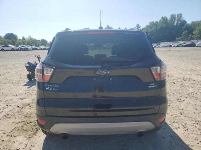 Photo 6 from auction – 2017 FORD ESCAPE SE with VIN 1FMCU9GD0HUD47438