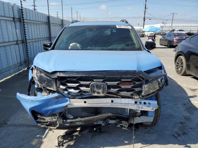 Photo 5 from auction – 2024 HONDA PASSPORT T with VIN 5FNYF8H69RB012767
