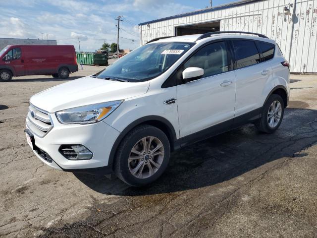 FORD ESCAPE SE 2018 with VIN 1FMCU9GD6JUC29058 - Photo from auction