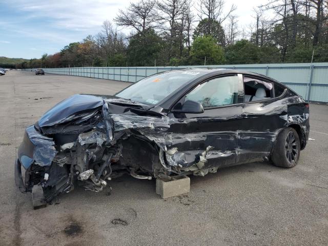 TESLA MODEL Y 2024 with VIN 7SAYGDEE5RA222221 - Photo from auction