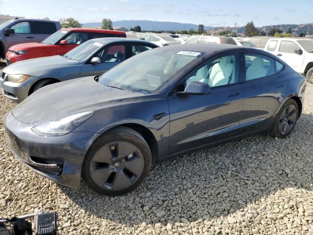 TESLA MODEL 3 2023 with VIN 5YJ3E1EAXPF699610 - Photo from auction
