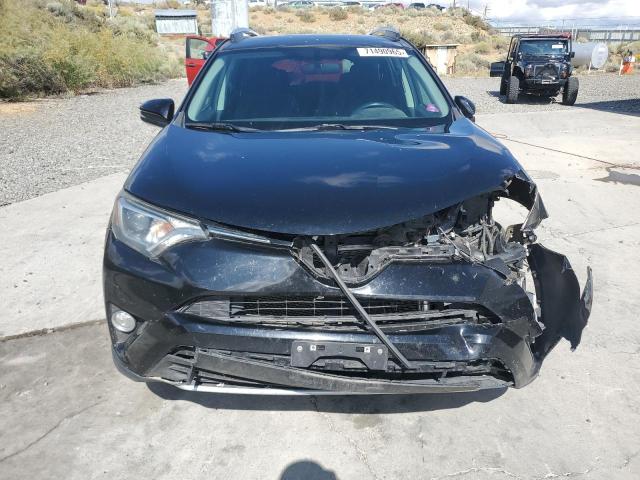 Photo 5 from auction – 2016 TOYOTA RAV4 XLE with VIN 2T3RFREV0GW485308
