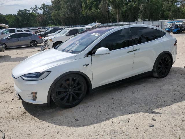 TESLA MODEL X 2018 with VIN 5YJXCBE20JF103871 - Photo from auction
