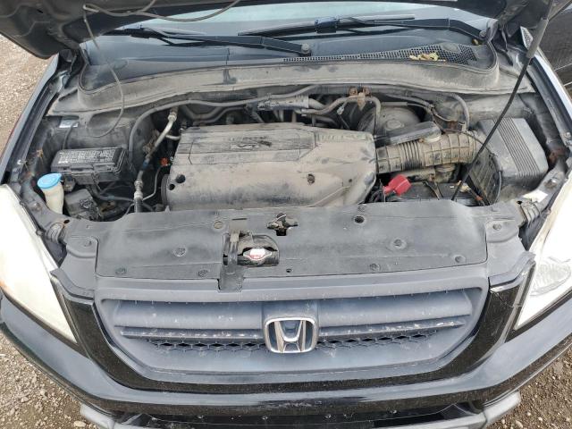 Photo 12 from auction – 2003 HONDA PILOT with VIN 2HKYF18583H603938
