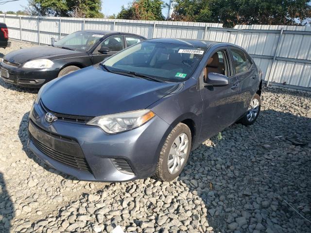 TOYOTA COROLLA L 2014 with VIN 5YFBURHE2EP027005 - Photo from auction