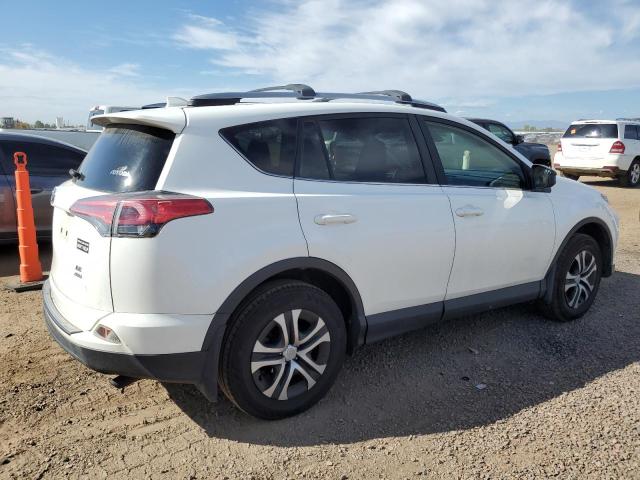 Photo 3 from auction – 2017 TOYOTA RAV4 LE with VIN JTMBFREV0HJ133251