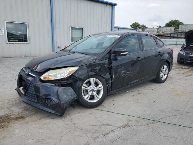 FORD FOCUS SE 2014 with VIN 1FADP3F26EL410613 - Photo from auction