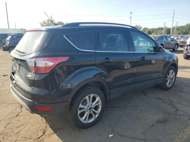 Photo 3 from auction – 2018 FORD ESCAPE SE with VIN 1FMCU9GDXJUB08503