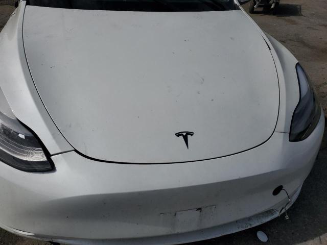 Photo 11 from auction – 2023 TESLA MODEL Y with VIN 7SAYGAEEXPF801994