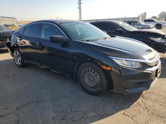 Photo 4 from auction – 2018 HONDA CIVIC LX with VIN 2HGFC2F56JH506818