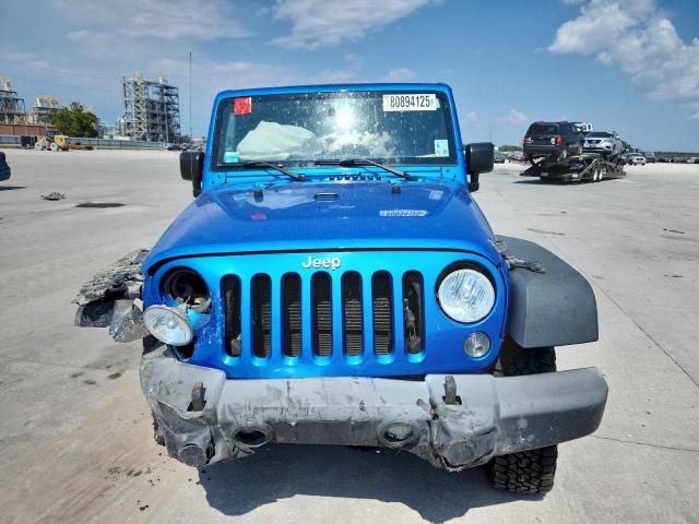Photo 5 from auction – 2016 JEEP WRANGLER U with VIN 1C4BJWFG3GL128786