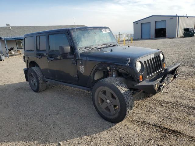 Photo 4 from auction – 2011 JEEP WRANGLER U with VIN 1J4BA6H17BL566335