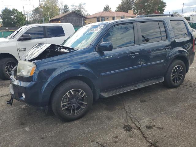 HONDA PILOT EXLN 2011 with VIN 5FNYF4H7XBB067865 - Photo from auction