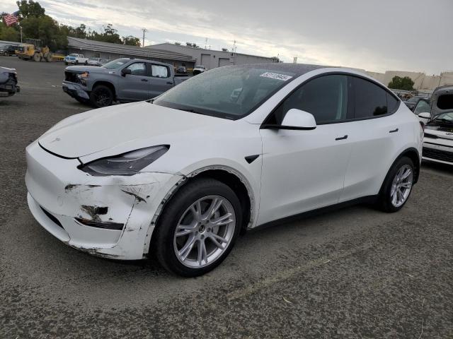 TESLA MODEL Y 2023 con VIN 7SAYGAEE5PF703777 - Foto de la subasta