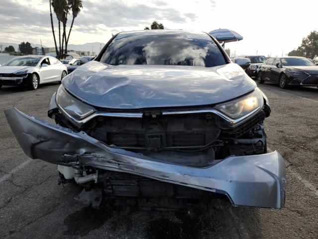 Photo 5 from auction – 2018 HONDA CR-V with VIN 5J6RW1H59JA010723