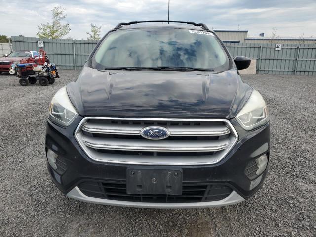 Photo 5 from auction – 2017 FORD ESCAPE SE with VIN 1FMCU0G98HUA65331