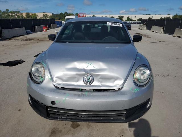 Photo 5 from auction – 2014 VOLKSWAGEN BEETLE with VIN 3VWF17AT1EM638638