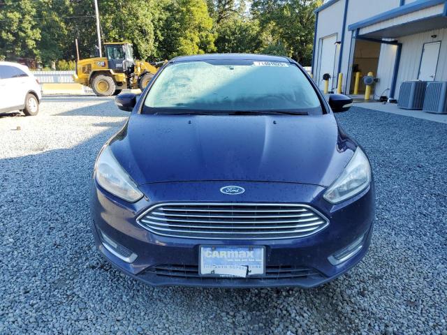 Photo 5 from auction – 2016 FORD FOCUS TITANIUM with VIN 1FADP3J27GL357558