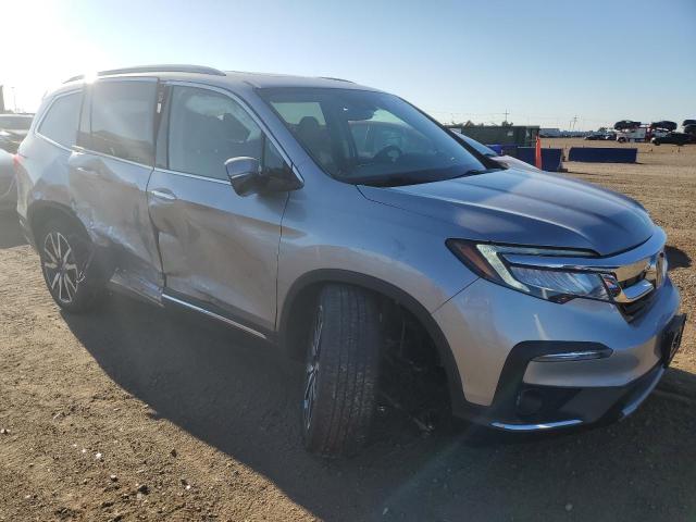 Photo 4 from auction – 2021 HONDA PILOT TOURING with VIN 5FNYF6H67MB034473