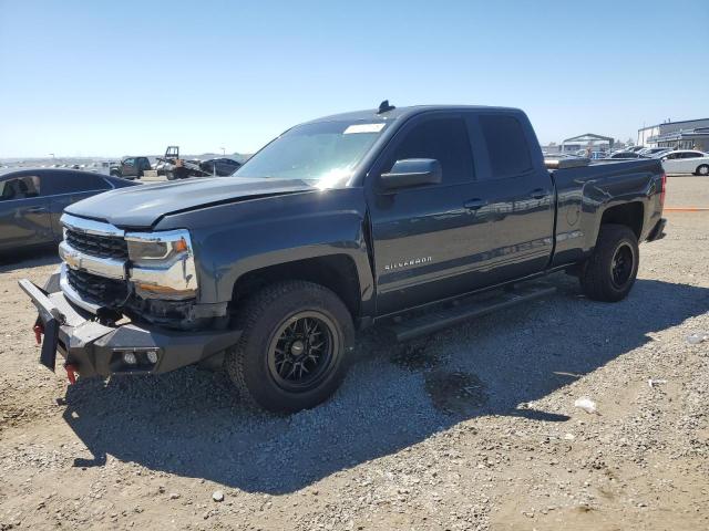 CHEVROLET SILVERADO 2018 with VIN 2GCRCREC9J1111187 - Photo from auction