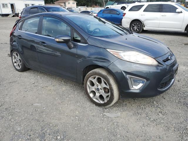 Photo 4 from auction – 2011 FORD FIESTA SES with VIN 3FADP4FJ9BM122219