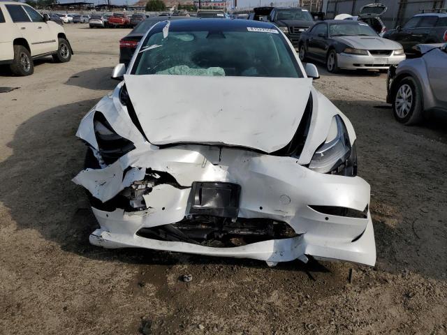 Photo 5 from auction – 2021 TESLA MODEL 3 with VIN 5YJ3E1EA1MF940403