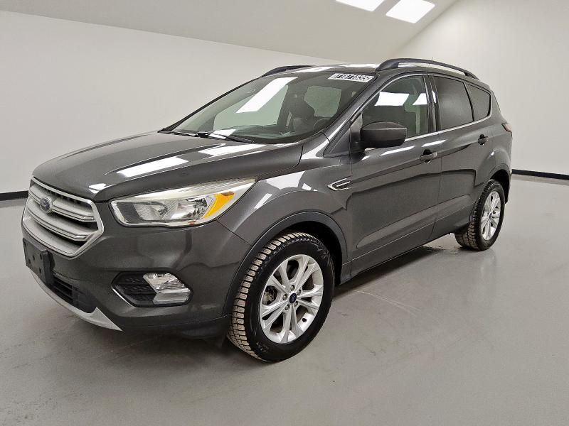 FORD ESCAPE SE 2018 with VIN 1FMCU9GD4JUB16192 - Photo from auction