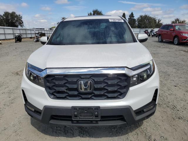 Photo 5 from auction – 2024 HONDA PASSPORT E with VIN 5FNYF8H52RB022709