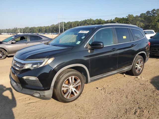 HONDA PILOT EXL 2016 with VIN 5FNYF5H52GB009471 - Photo from auction