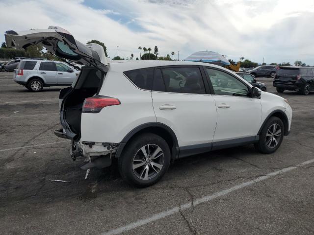 Photo 3 from auction – 2017 TOYOTA RAV4 XLE with VIN JTMWFREVXHJ148969