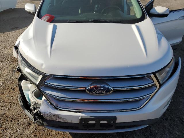 Photo 11 from auction – 2015 FORD EDGE SEL with VIN 2FMTK3J86FBB34270