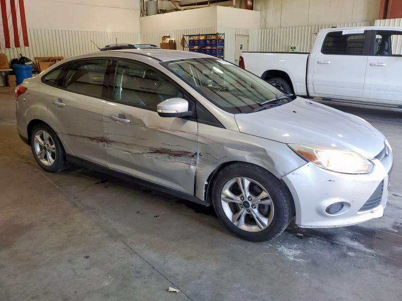 Foto 4 de la subasta – 2014 FORD FOCUS SE con VIN 1FADP3F25EL106110