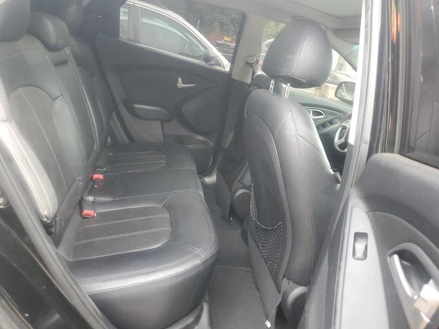 Photo 11 from auction – 2012 HYUNDAI TUCSON GLS with VIN KM8JUCAC8CU542913