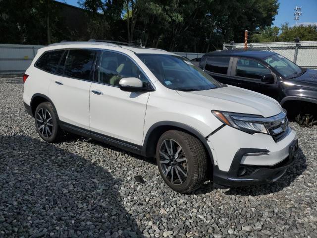 Photo 4 from auction – 2021 HONDA PILOT TOUR with VIN 5FNYF6H63MB010672