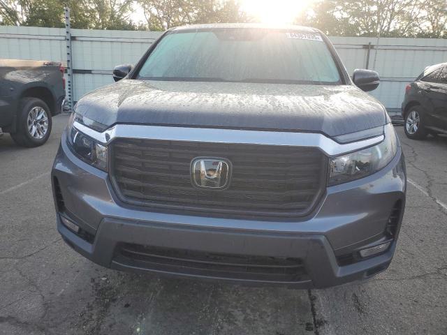 Photo 5 from auction – 2023 HONDA RIDGELINE with VIN 5FPYK3F58PB022543