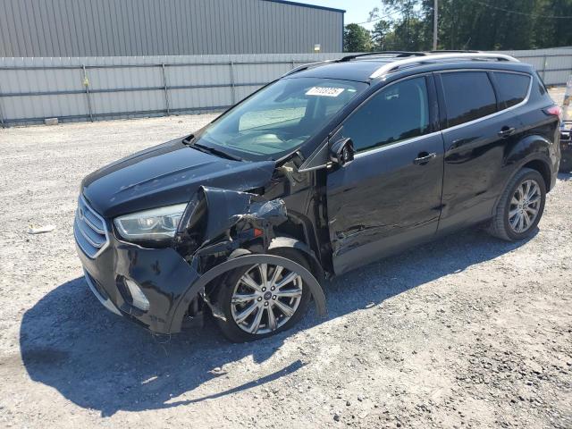 FORD ESCAPE TIT 2018 with VIN 1FMCU0J95JUA06882 - Photo from auction
