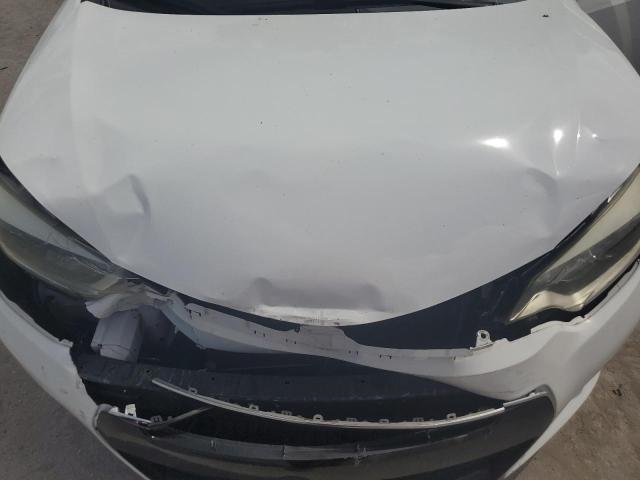 Photo 11 from auction – 2014 TOYOTA COROLLA L with VIN 2T1BURHE6EC041893