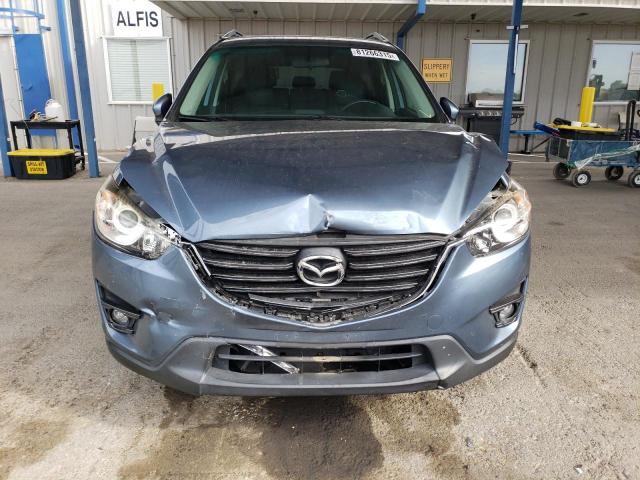Photo 5 from auction – 2016 MAZDA CX-5 TOURING with VIN JM3KE2CY0G0787119