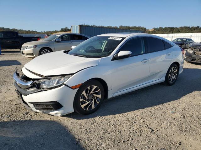 HONDA CIVIC EX 2017 with VIN 19XFC2F70HE233638 - Photo from auction
