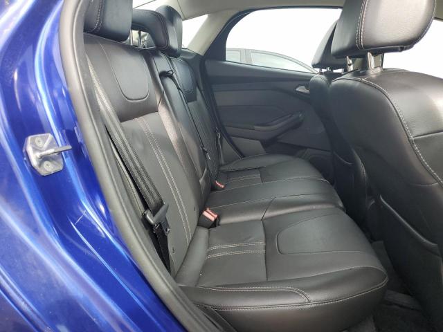Photo 10 from auction – 2014 FORD FOCUS TITA with VIN 1FADP3J29EL338636