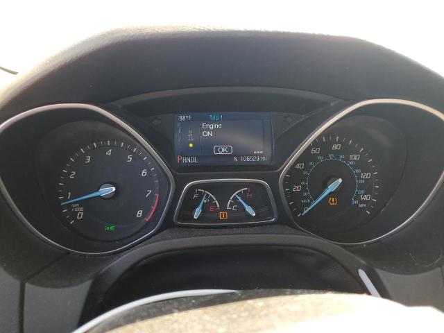 Photo 9 from auction – 2014 FORD FOCUS SE with VIN 1FADP3F2XEL243298