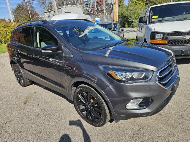 FORD ESCAPE TIT 2019 with VIN 1FMCU9J9XKUC12950 - Photo from auction