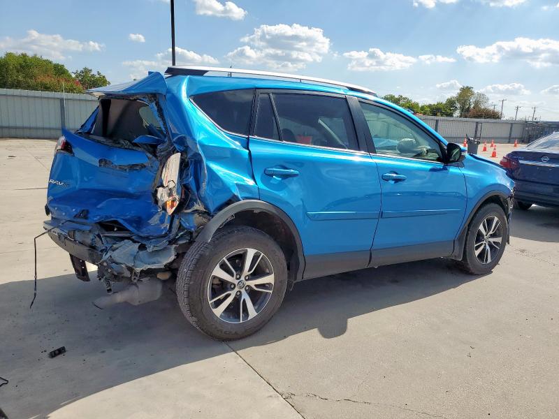 Photo 3 from auction – 2016 TOYOTA RAV4 XLE with VIN JTMWFREV4GJ099069