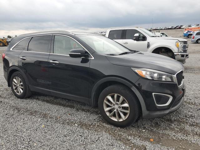 Photo 4 from auction – 2016 KIA SORENTO LX with VIN 5XYPG4A32GG021639